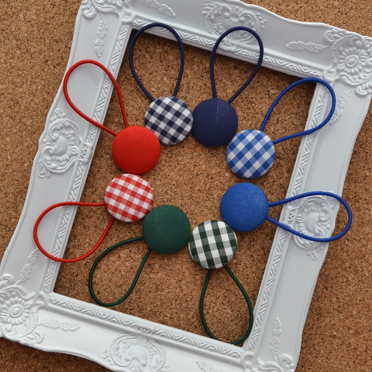 Button hair ties in school colours