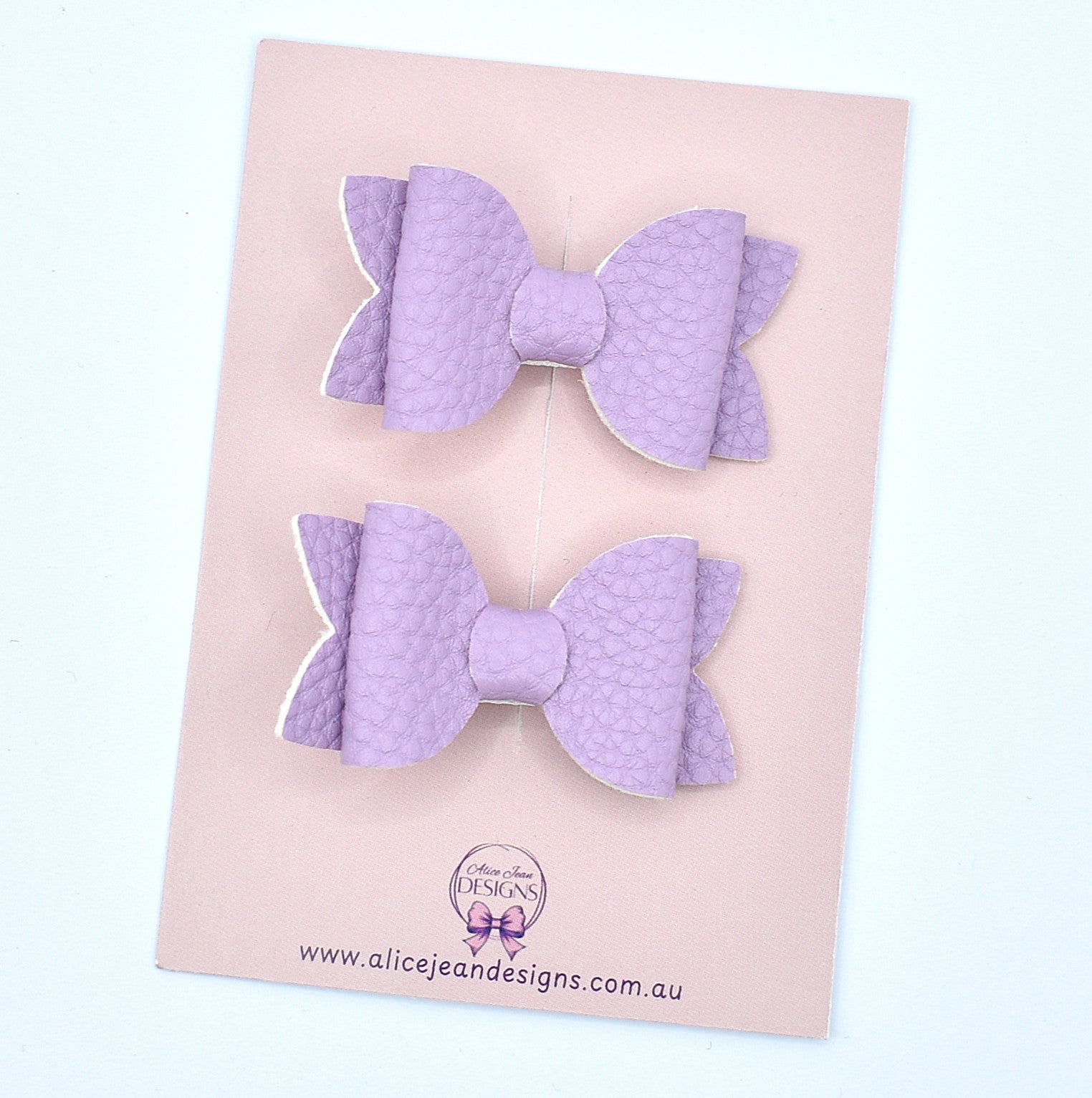 Annabelle - small leather piggytail bows - purple
